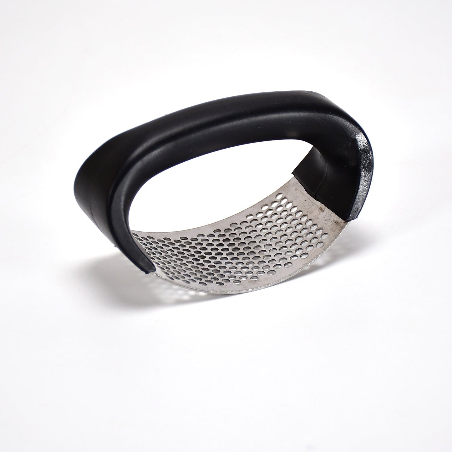 The ergonomic grip handles of the Quickslice garlic crusher, designed for comfortable use.