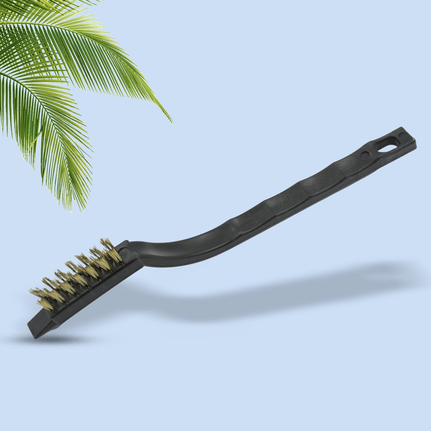 Ergonomic handle of a mini wire brush, showing comfortable grip and hanging hole.