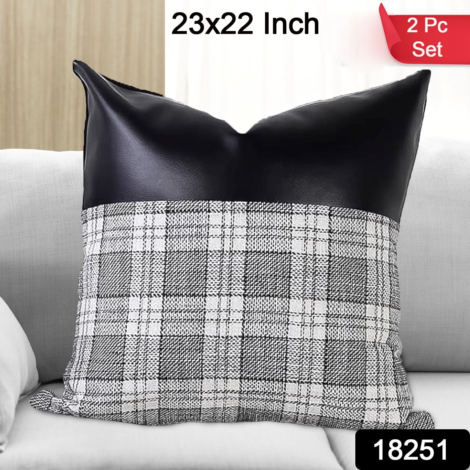 Two 23x22 inch Leather & Cotton Pillow Covers displayed on a bed.