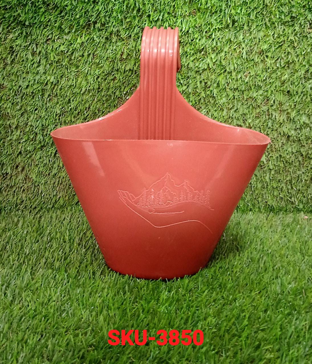 Single hanging planter pot on a balcony railing.