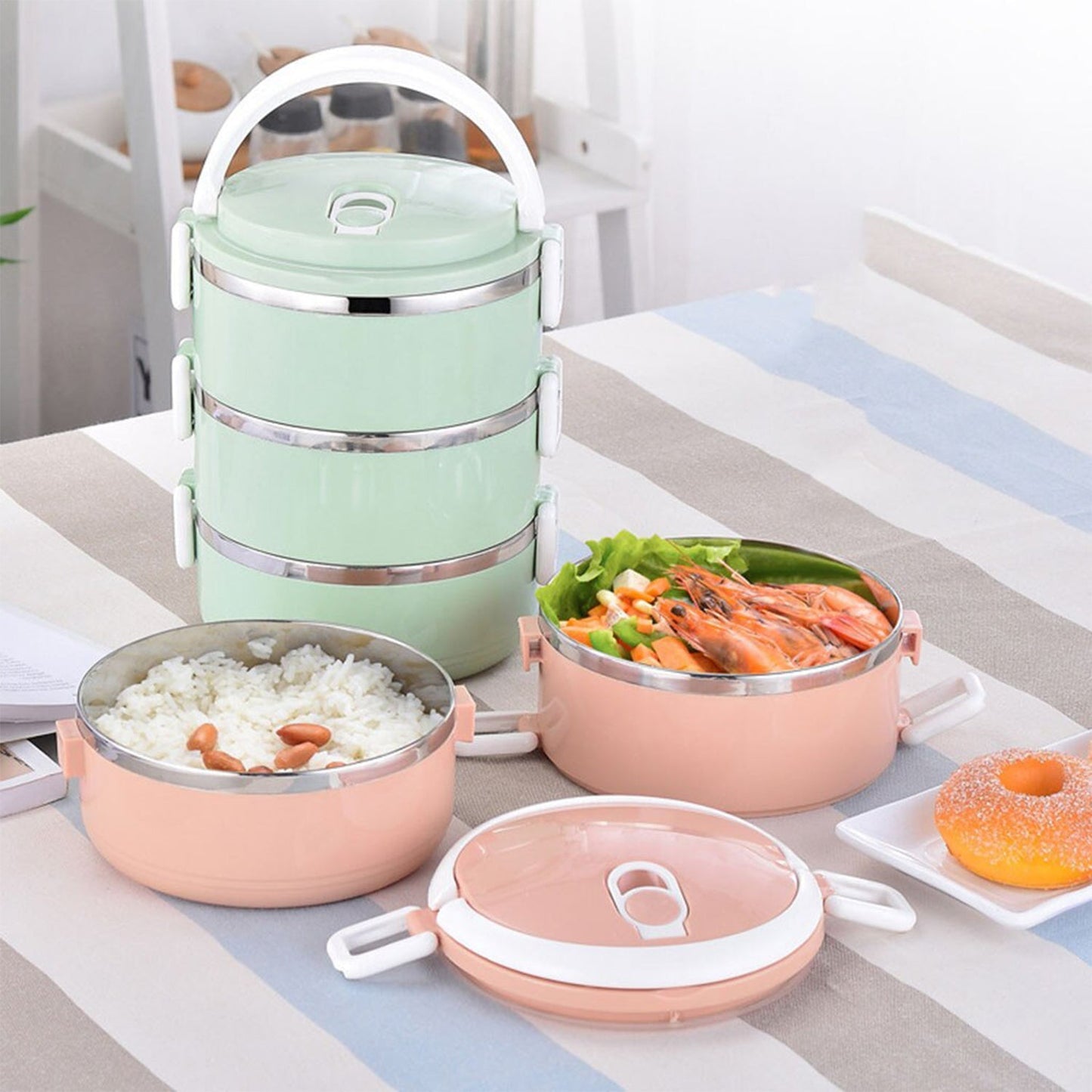 Three-layer stainless steel lunch box, perfect for warm meals.