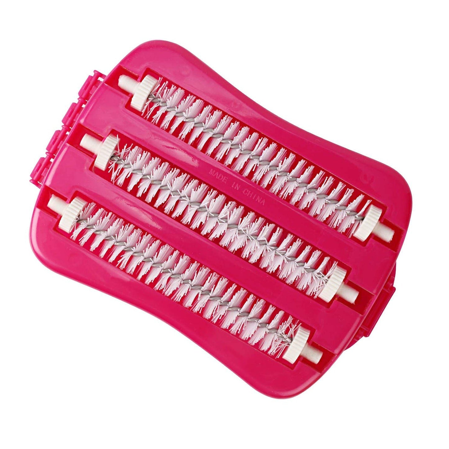 Versatile cleaning tool, a carpet roller brush, resting on a sofa, ready for quick tidying.