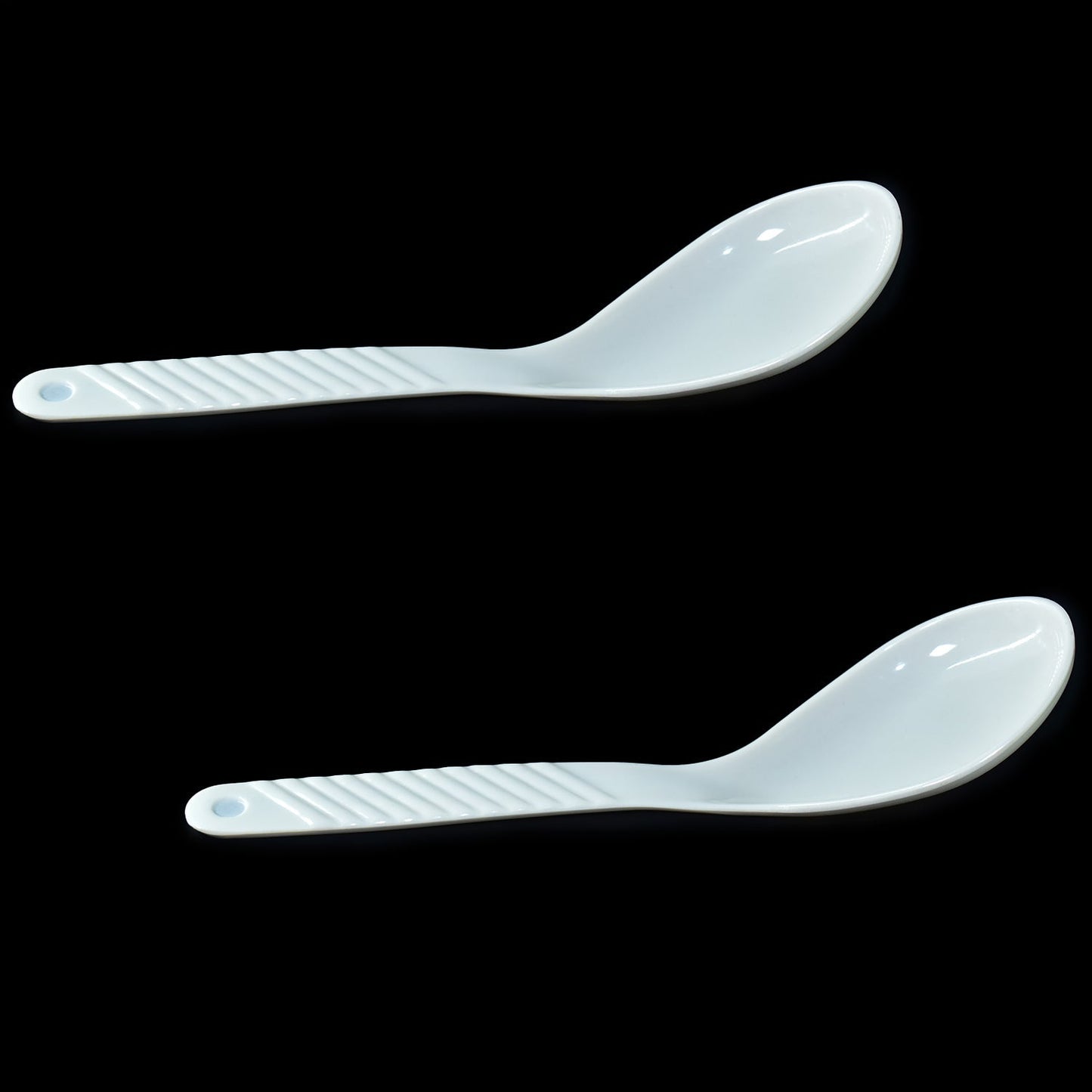 Neatly arranged 32-piece plastic tableware set, ideal for serving meals.
