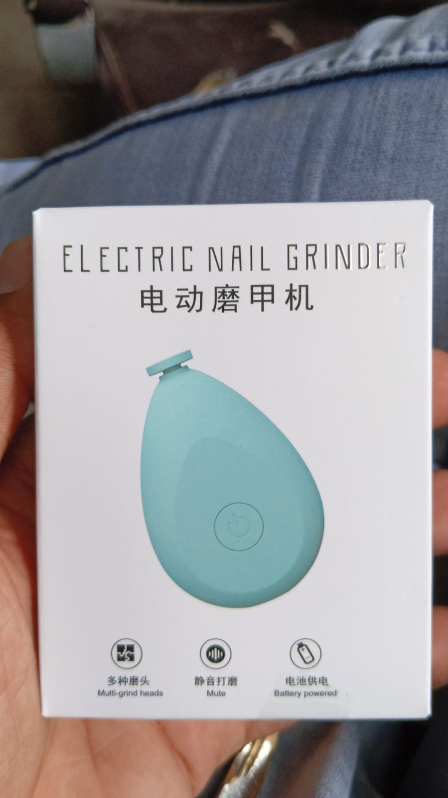 Side view of the ergonomic Baby Electric Nail Trimmer for comfortable infant nail care.