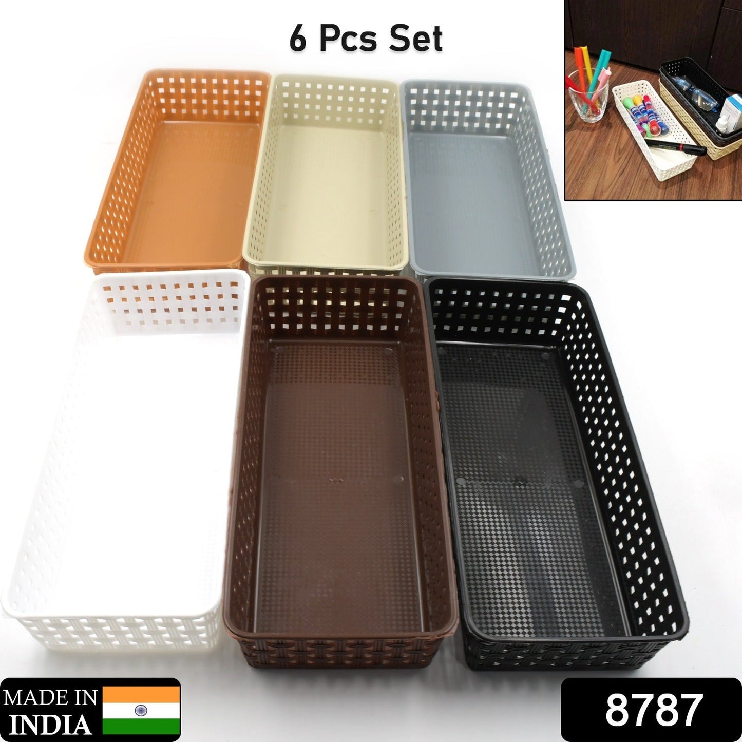 Multipurpose desk organizer trays neatly arranged inside a drawer with various items.
