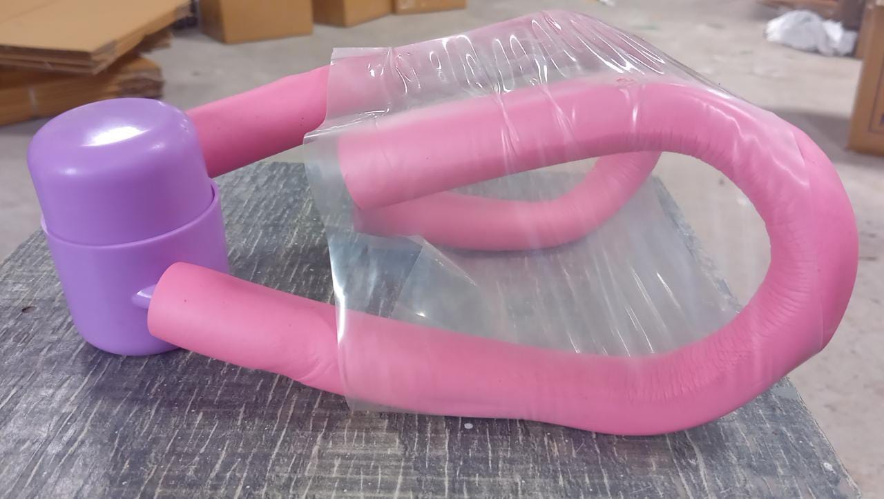 Angled view of the Thigh Toner, clearly showing its sturdy inner spring mechanism.