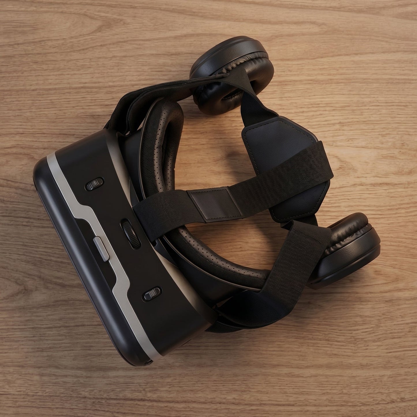 Controls for focus and volume on the Fitnos VR Headset.