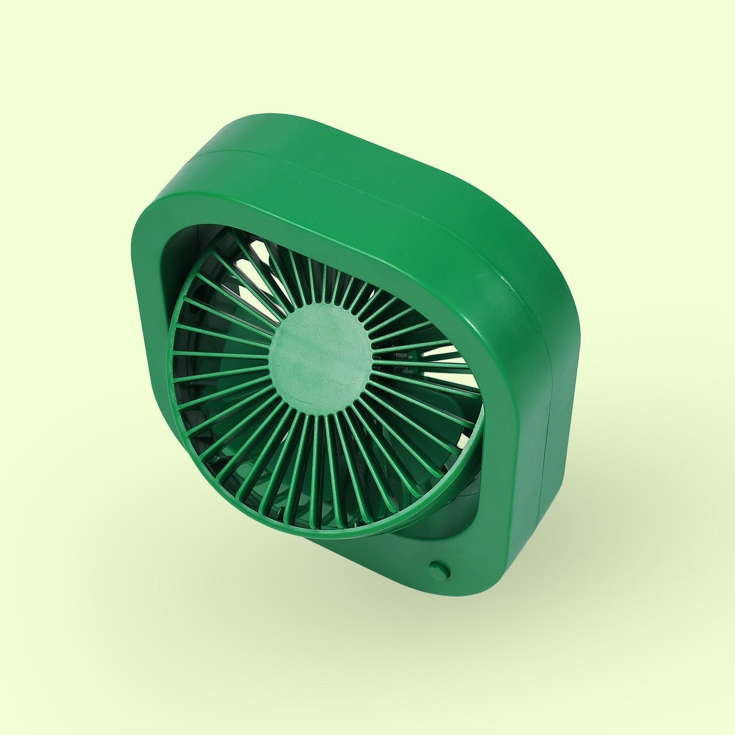 Quiet personal fan operating silently, providing a gentle breeze for focused work.