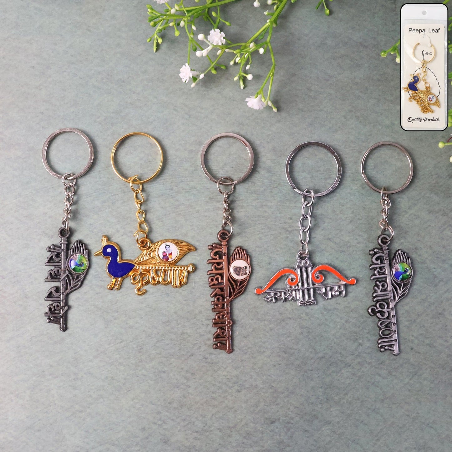 Krishna Theme metal keychain set with antique finish displaying detailed spiritual designs.