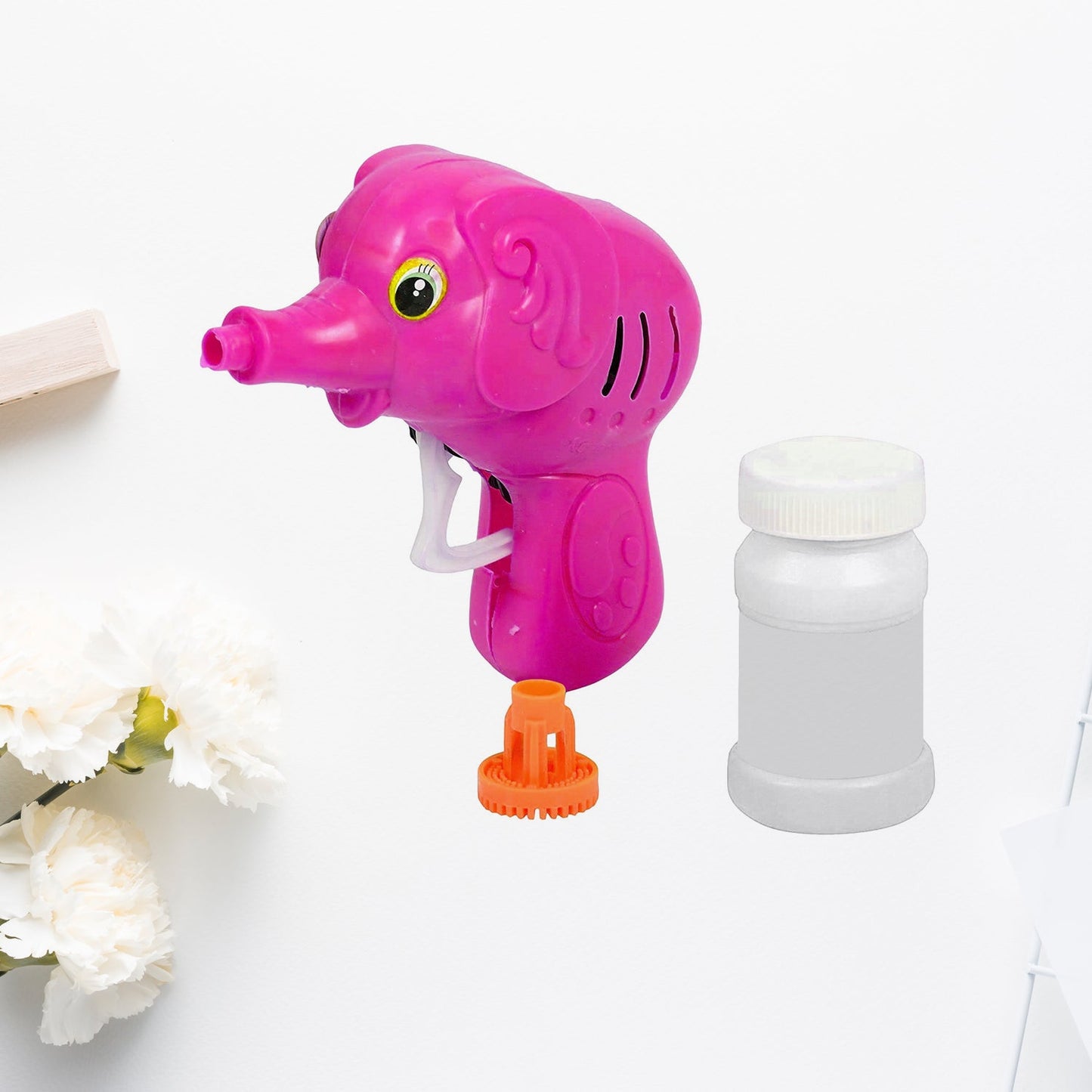 Close up of elephant bubble gun toy nozzle and trigger