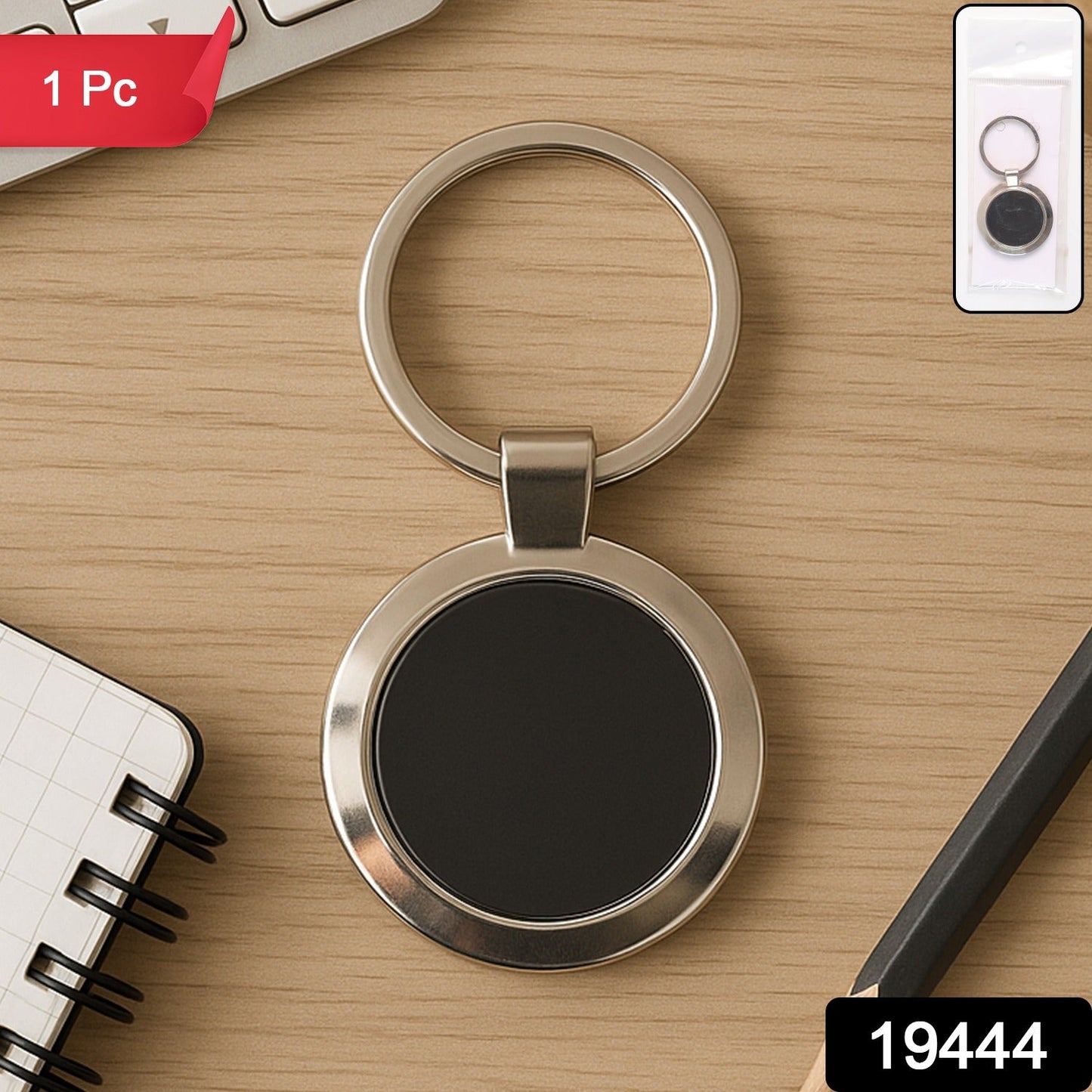 Metal keyring holder showcasing round design and glossy black insert.
