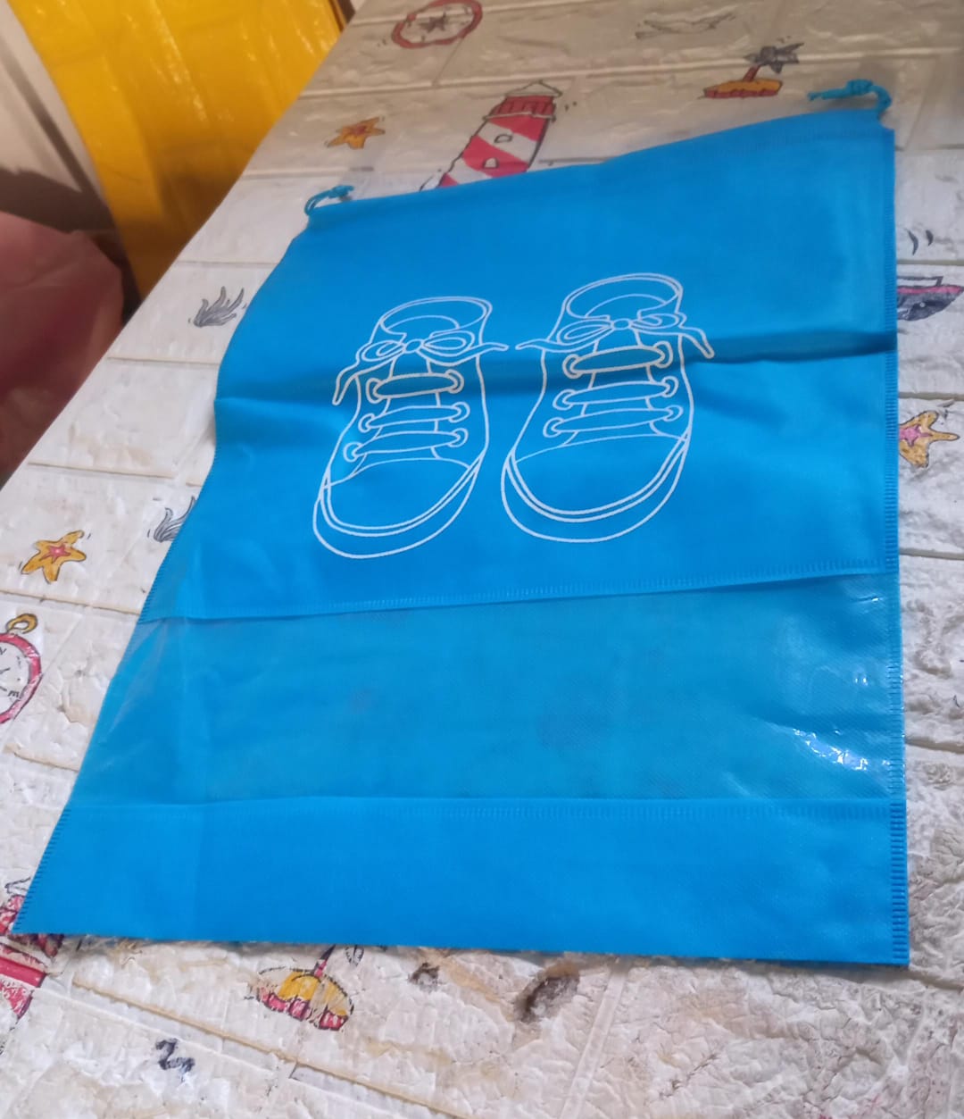 Versatile waterproof storage bag for clothes and travel items, showcased in a neat arrangement.