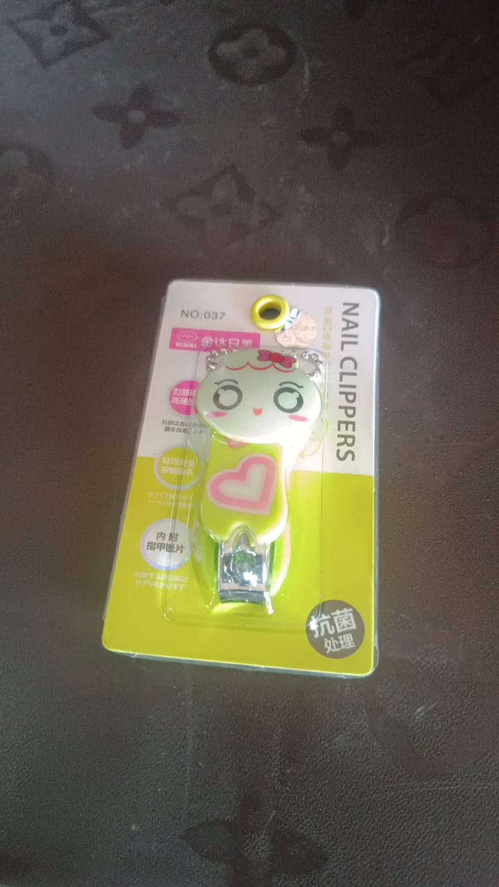 Cartoon-themed nail trimmer for kids, compact and portable