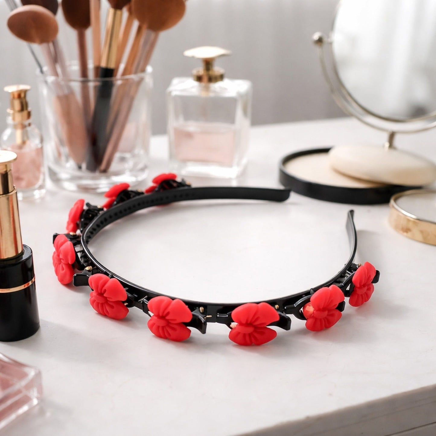 Floral headband with built-in mini claw clips for secure hair styling