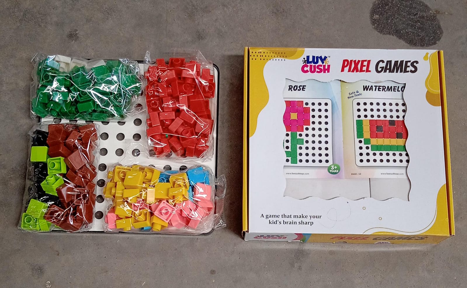 Two children collaborating on a math puzzle with pixel cubes.
