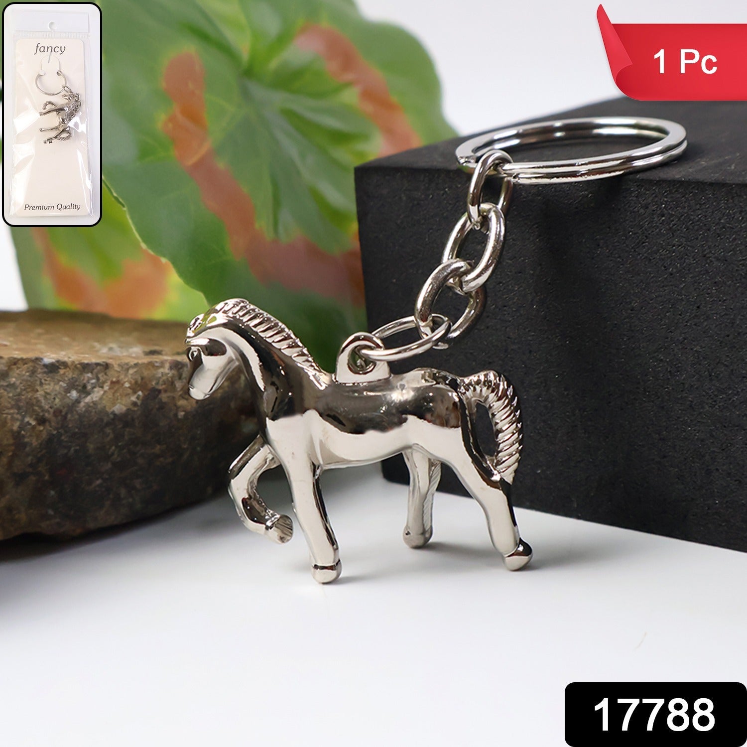Elegant horse-shaped metallic keyring holding car and home keys