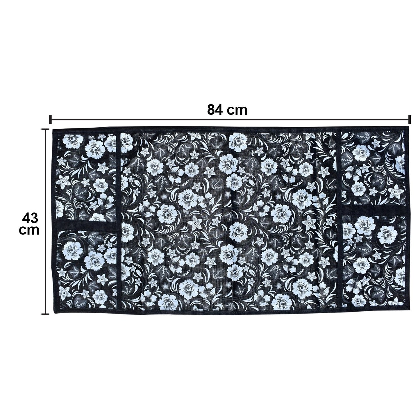 Microwave dust cover with an elegant design protecting a kitchen appliance.