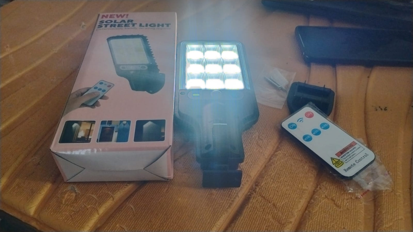 In-use lifestyle shot of  solar LED street light on exterior wall