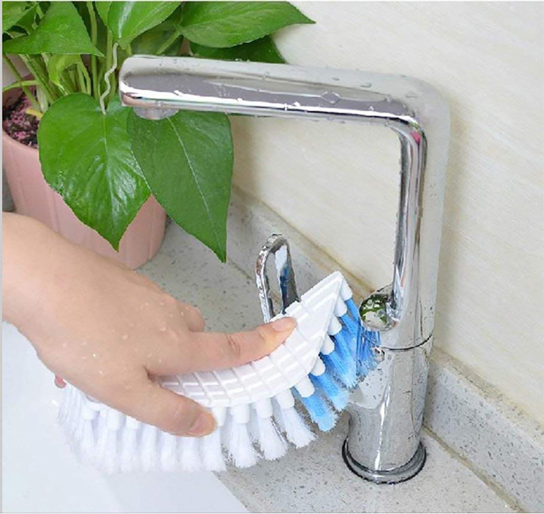 Ergonomic flexible cleaning brush angled to show effective reach for bathroom fixtures.