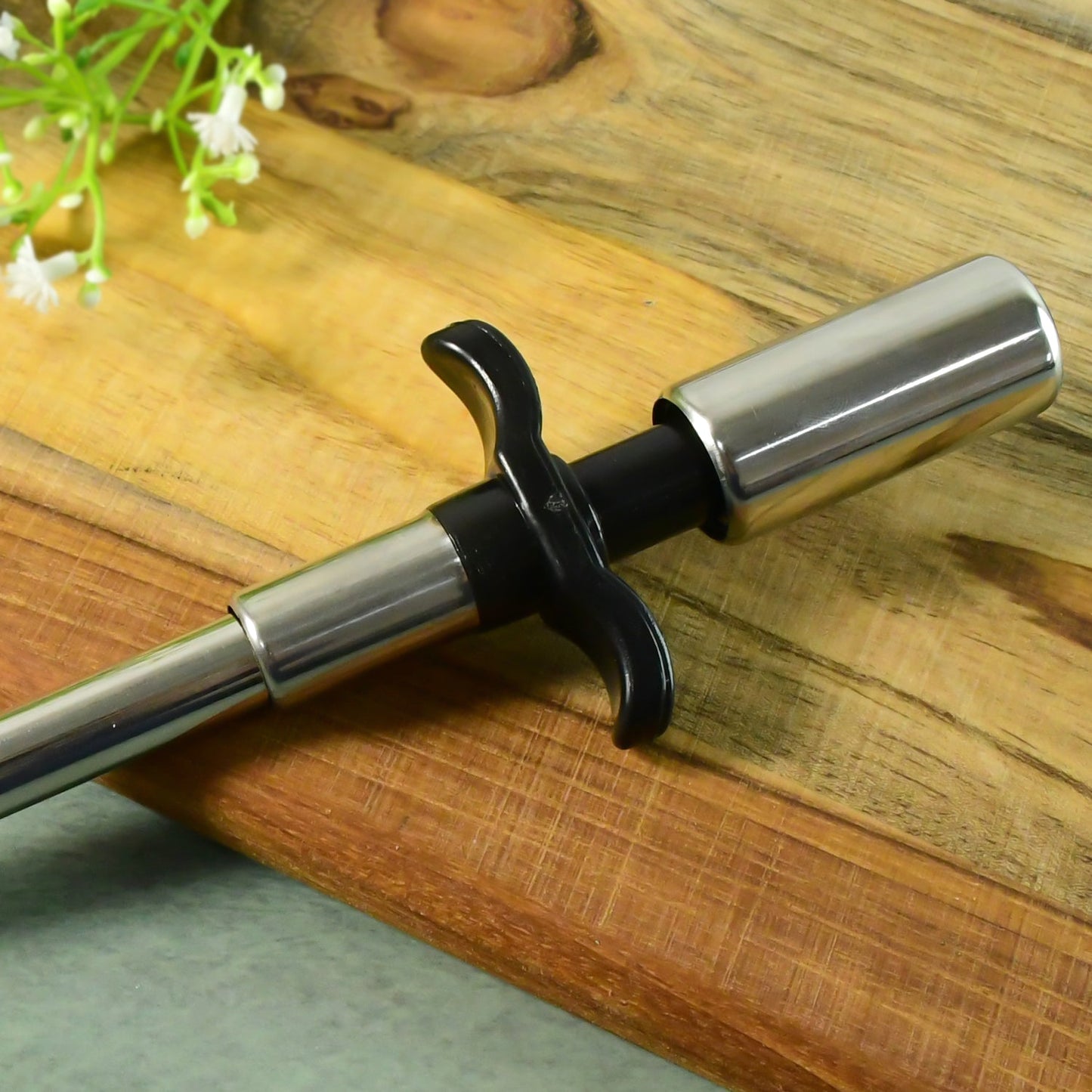 Apex kitchen gas stove lighter placed on a kitchen countertop