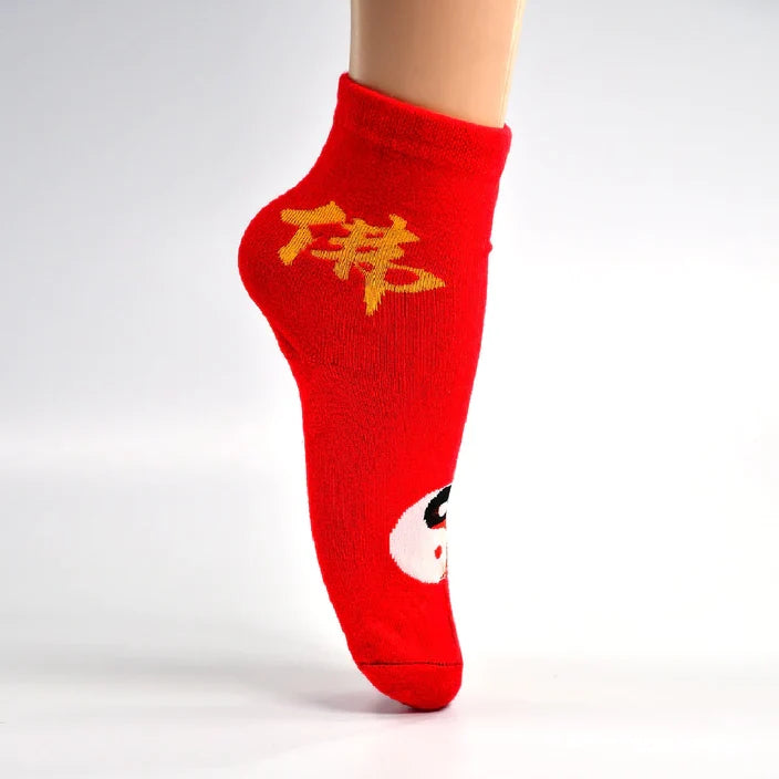 Various pairs of funky patterned socks for women, arranged neatly for display.