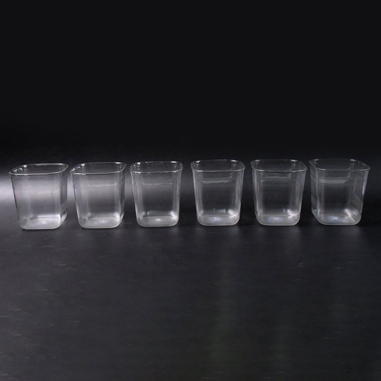 Side view of transparent diamond plastic glass set