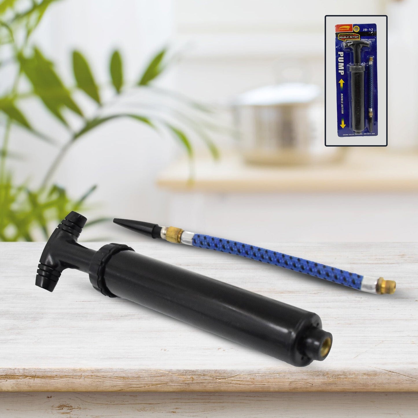 FitFuzion sports ball inflator with metal pin attachment.
