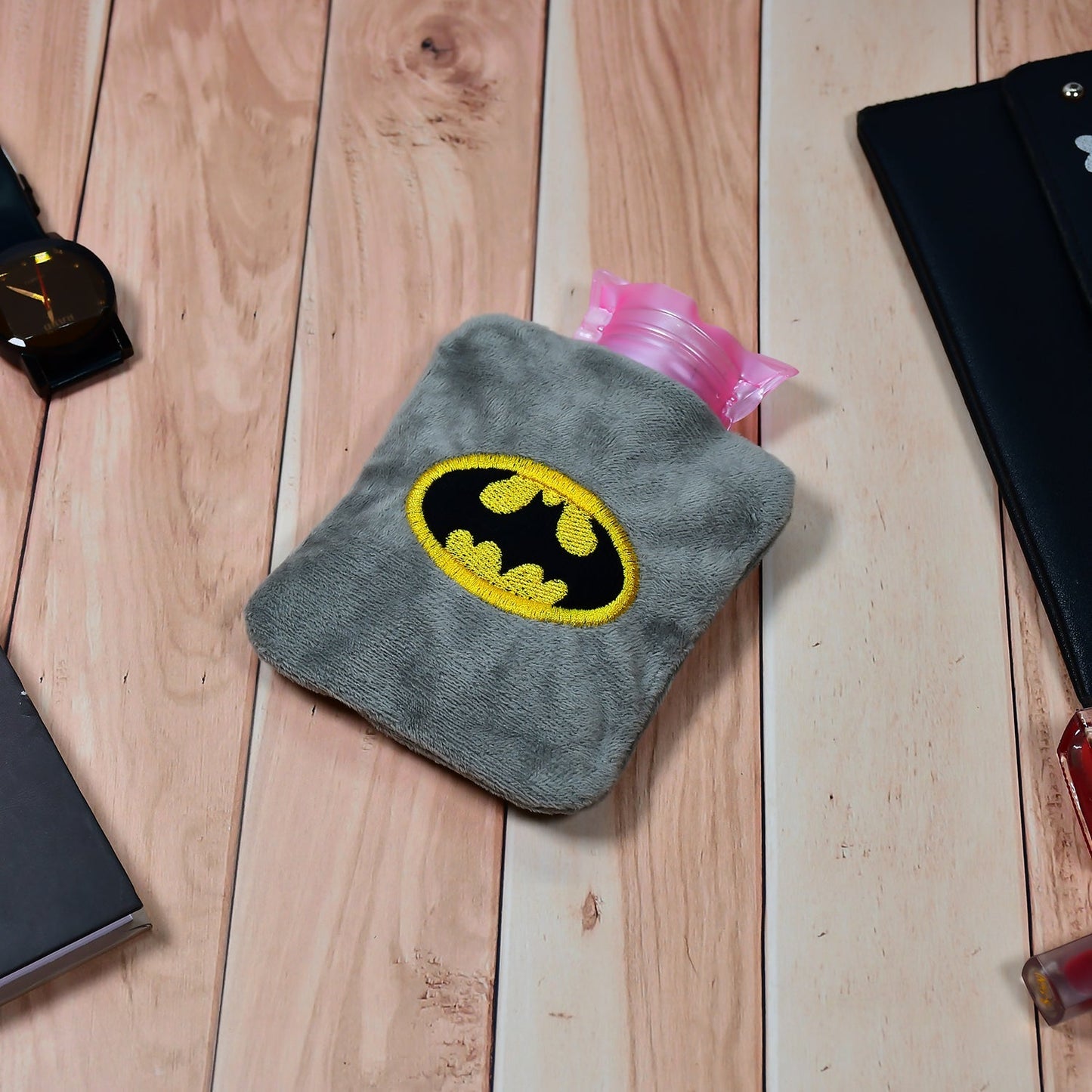 Close-up of Batman Hot Water Bag, effective for neck and shoulder pain relief.