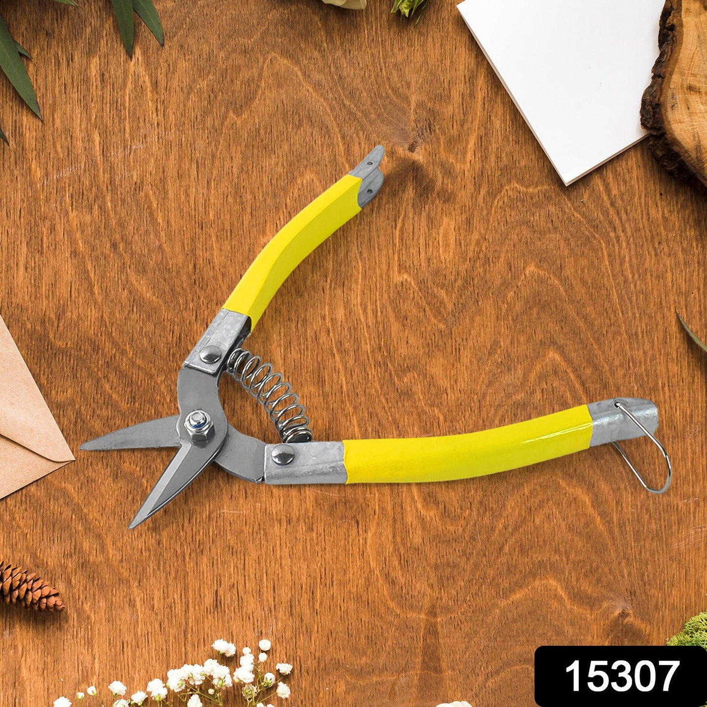 Precision garden snip pruning scissor trimming small plants and herbs