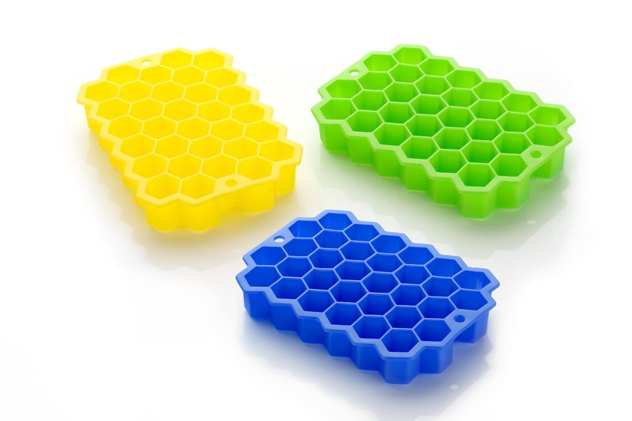 Vibrant multicolor silicone ice cube trays stacked for storage.