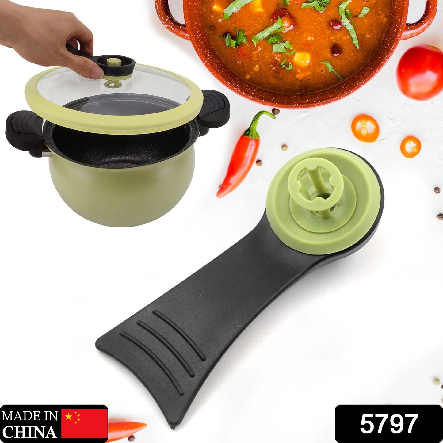 Close-up of the durable plastic pressure cooker handle.