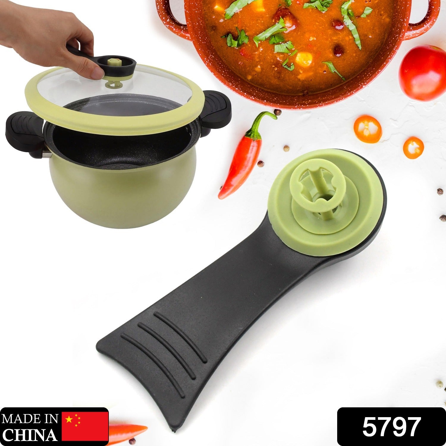 Close-up of the durable plastic pressure cooker handle.