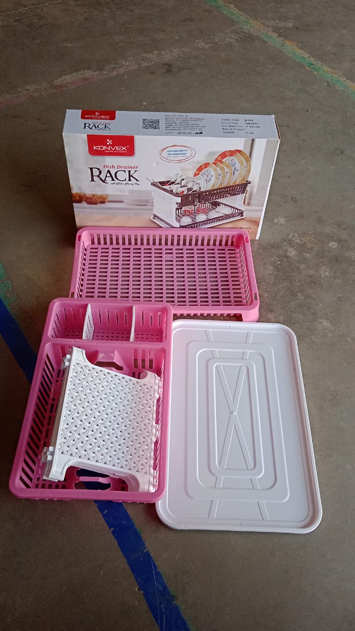 Organized kitchen counter featuring the plastic kitchen organizer rack with water tray