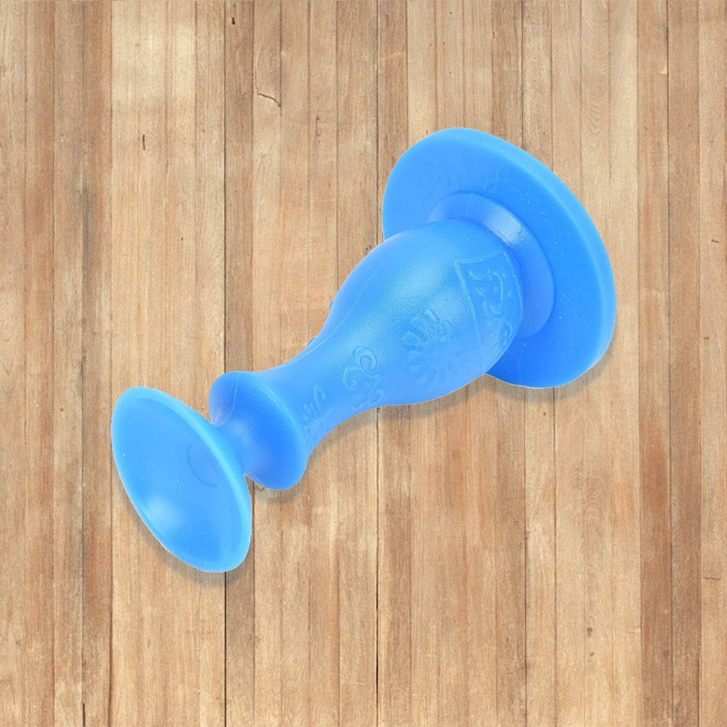 Versatile washer door stopper also functioning as a prop for a room door.