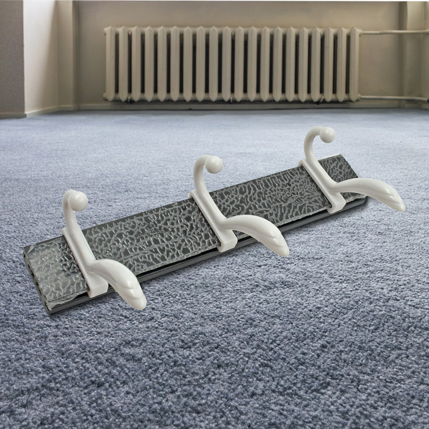 Minimalist GlimmerHome wall mounted coat rack holding a dog leash and jackets
