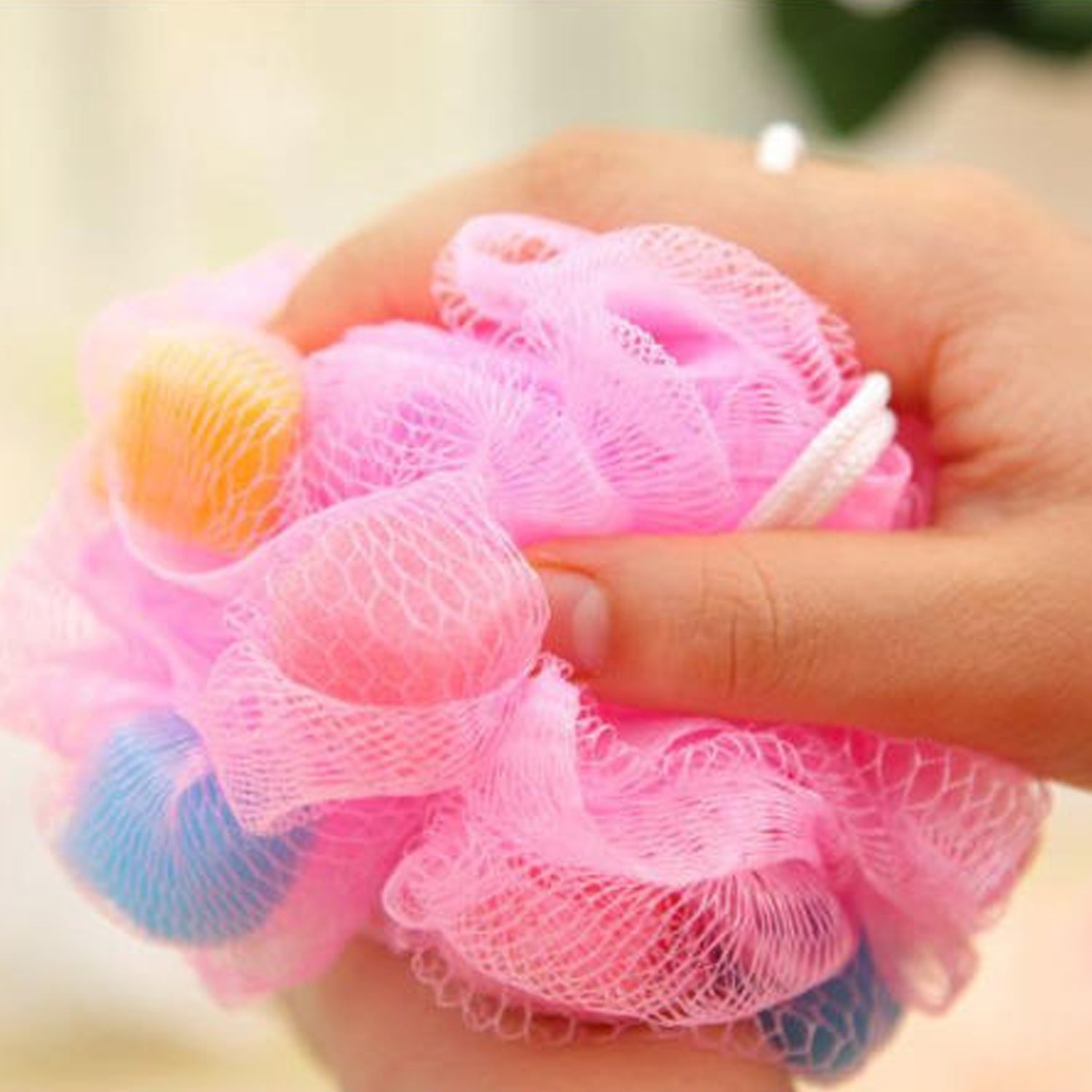 White round bath loofah ready for a refreshing bath or shower.
