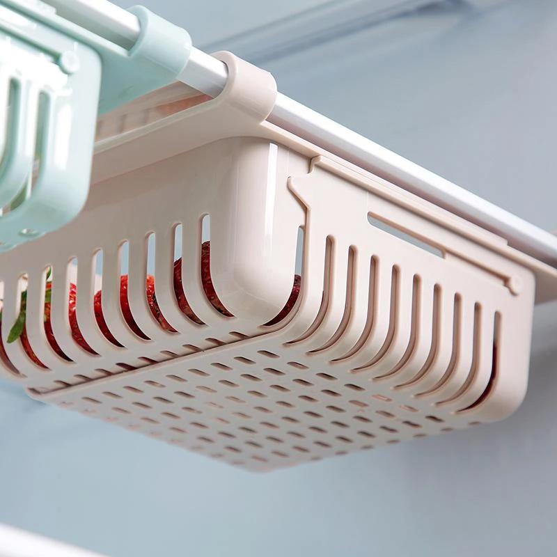 View of a fridge interior with organizers maximizing every inch of storage.