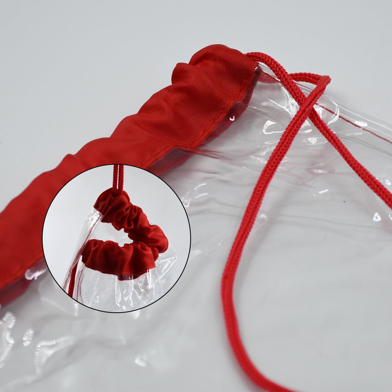 Transparent waterproof bag with a string handle, great for gym, beach, and travel use.