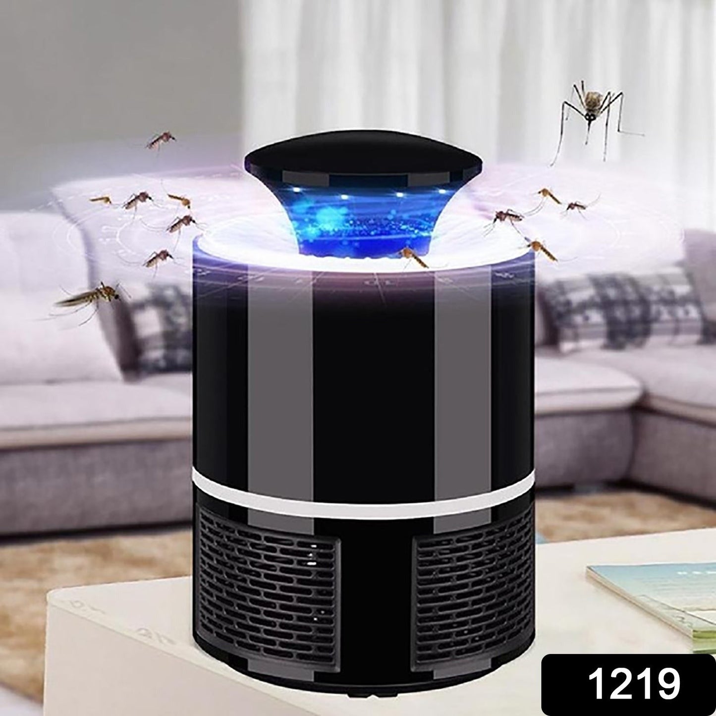 The FlyTamer mosquito killer lamp operating silently on a bedside table in a modern Indian home.