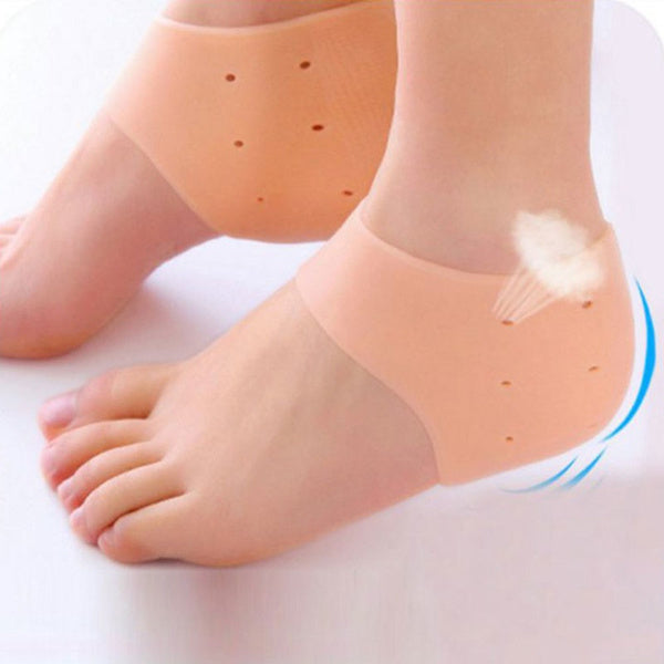 Silicone heel protector promoting soft, crack-free heels.