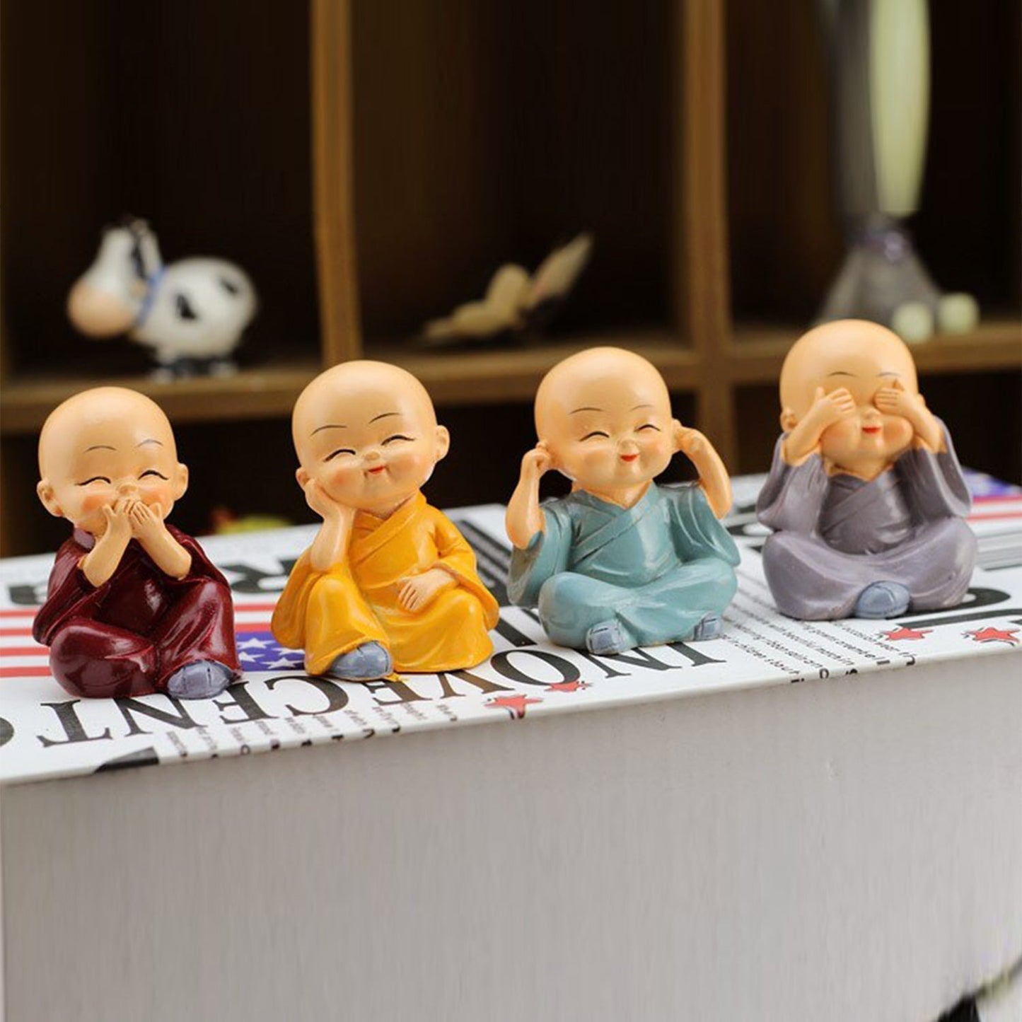 Lightweight baby Buddha showpieces arranged for official space