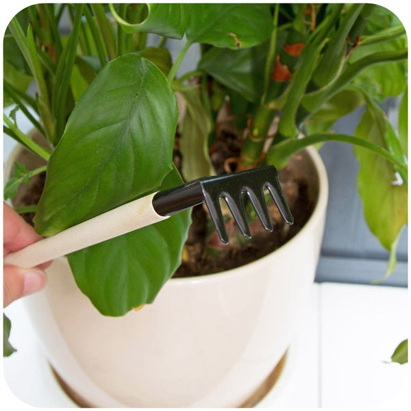 Detailed shot of the ergonomic handle on a child's gardening tool.