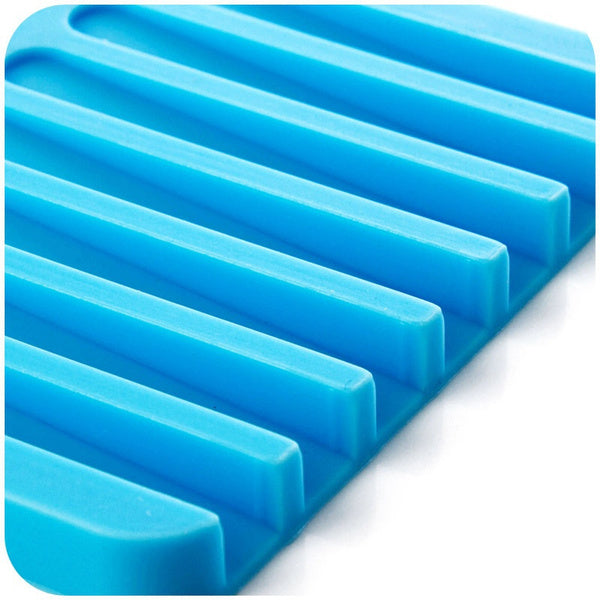 Durable silicone soap dish in white, designed for quick drying.