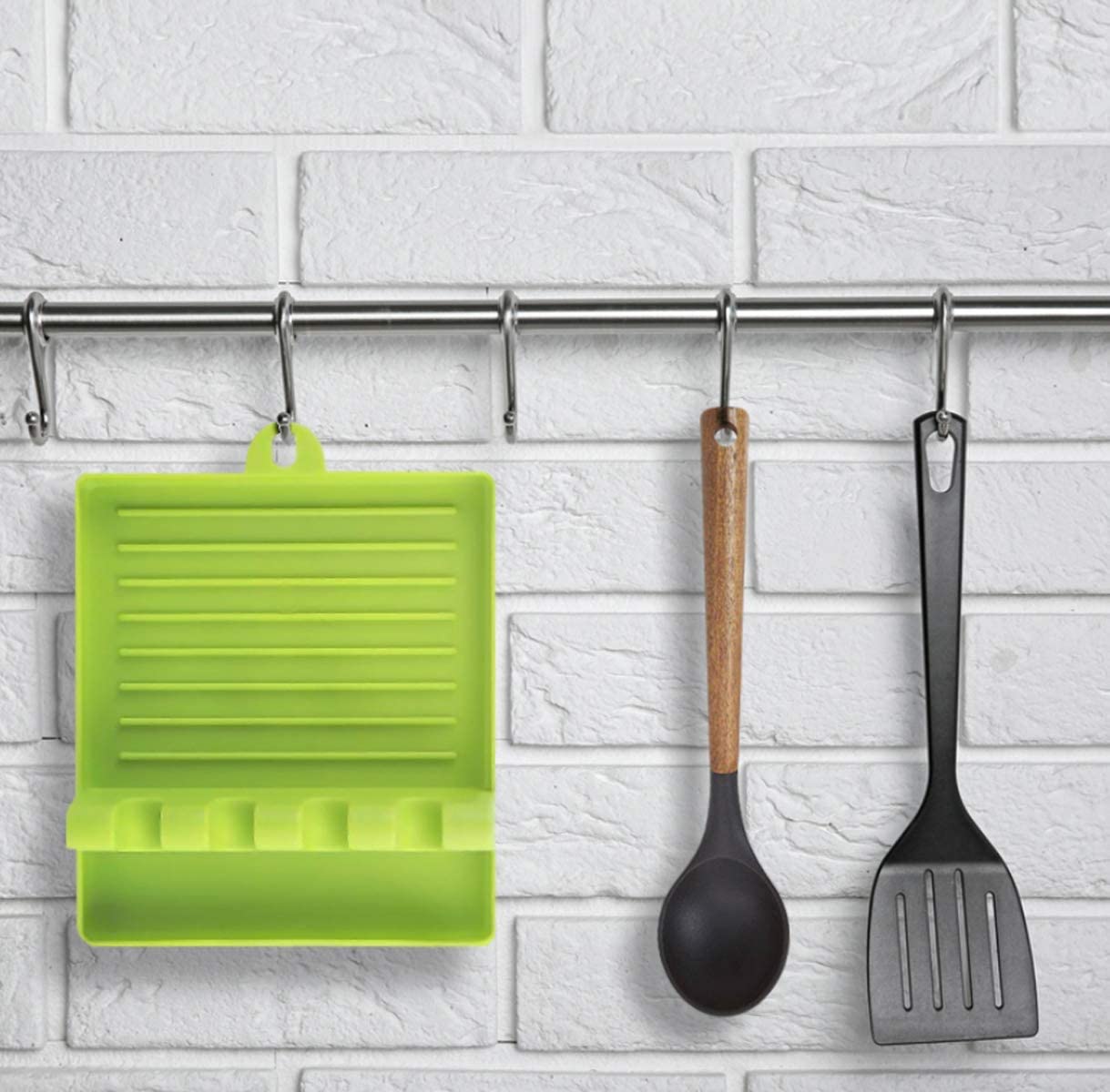 Compact silicone spatula holder and utensil rest for Indian kitchens.