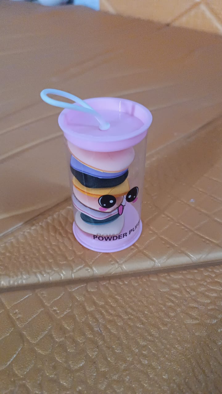 Mini Finger Makeup Powder Puff demonstrating application on face