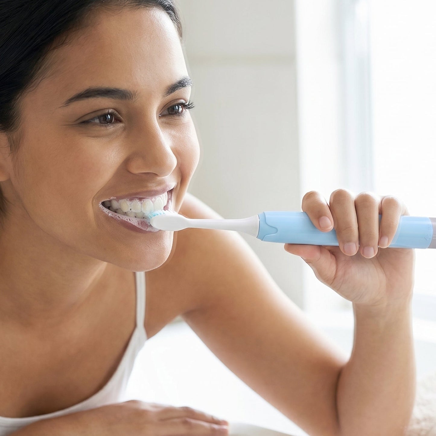 Adult using electric sonic toothbrush for effective dental hygiene