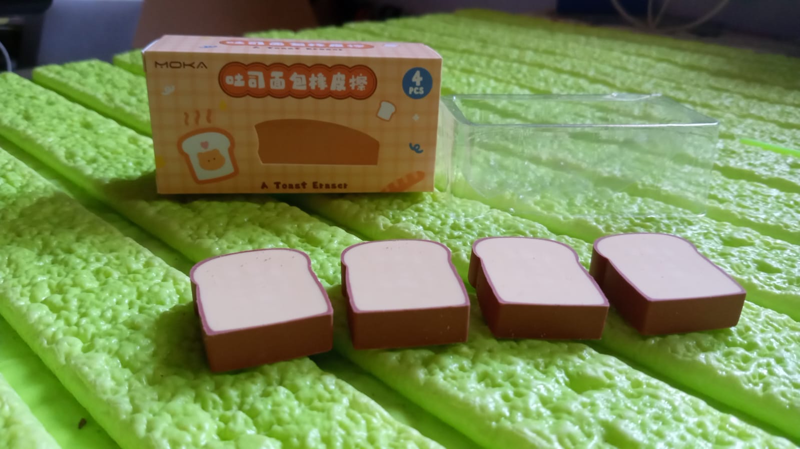 Packaging of the 4-piece toast bread eraser set from TinyTrendy.