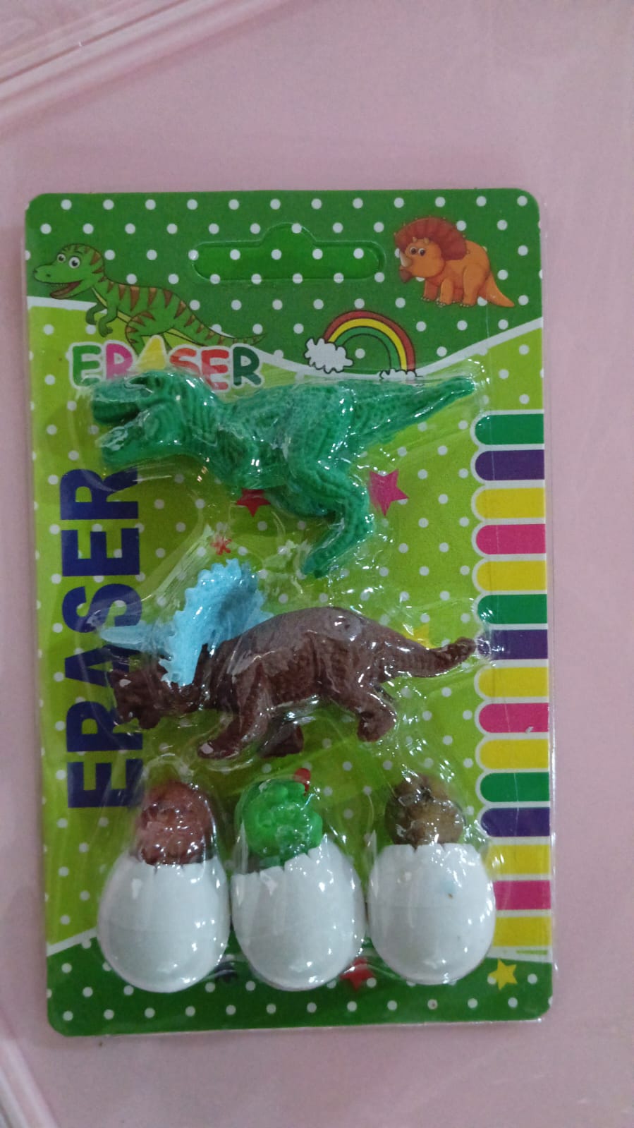 Retail packaging for the 5-piece dinosaur puzzle erasers set.