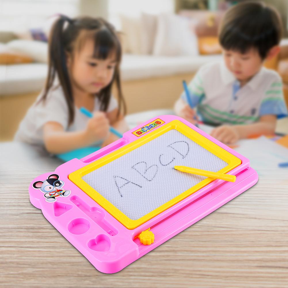Child drawing on a vibrant Aditi Magnetic Drawing Board with a magnetic pen.