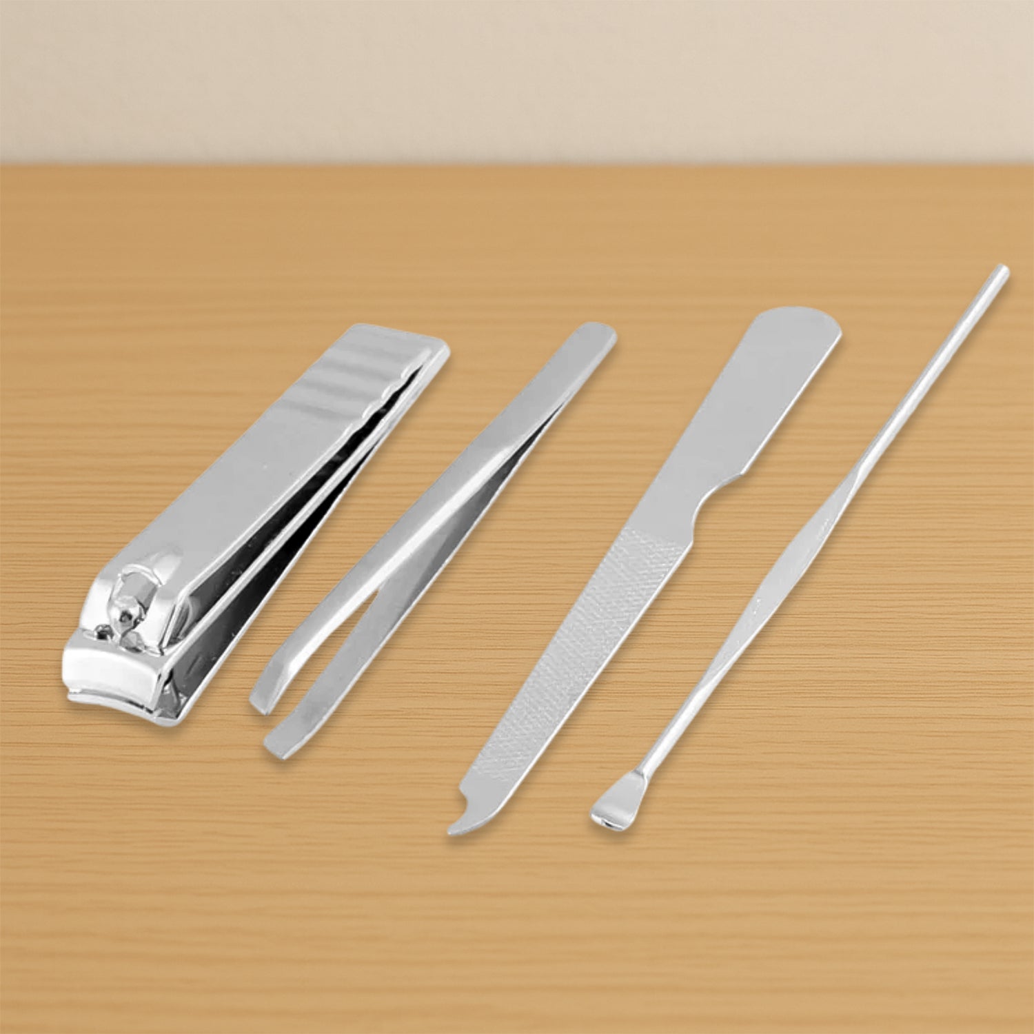 4-in-1 stainless steel nail clipper kit displayed with its travel case.